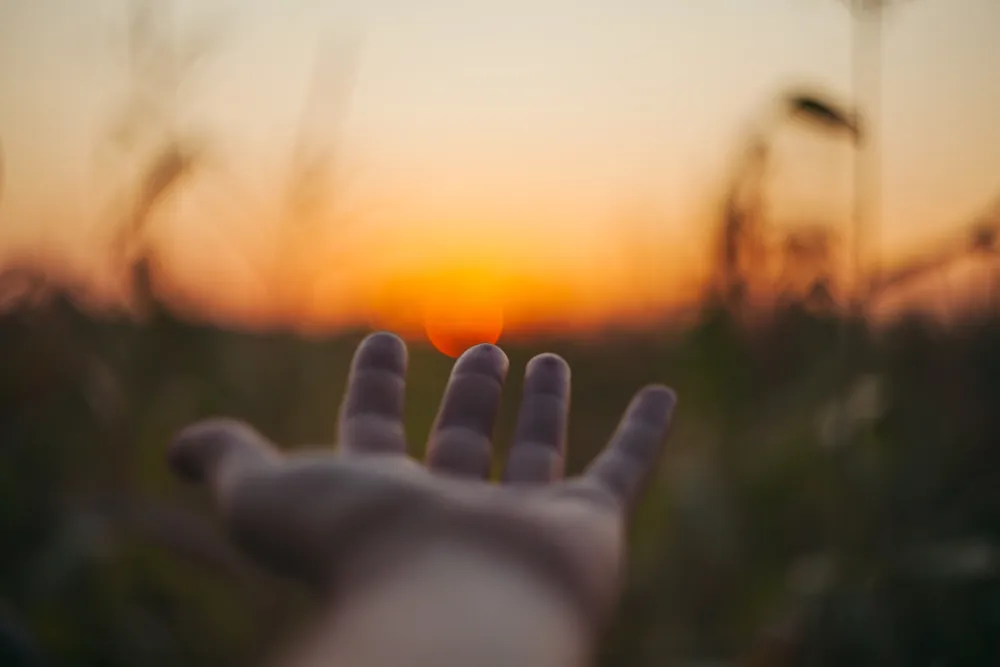 Hand und Sonne