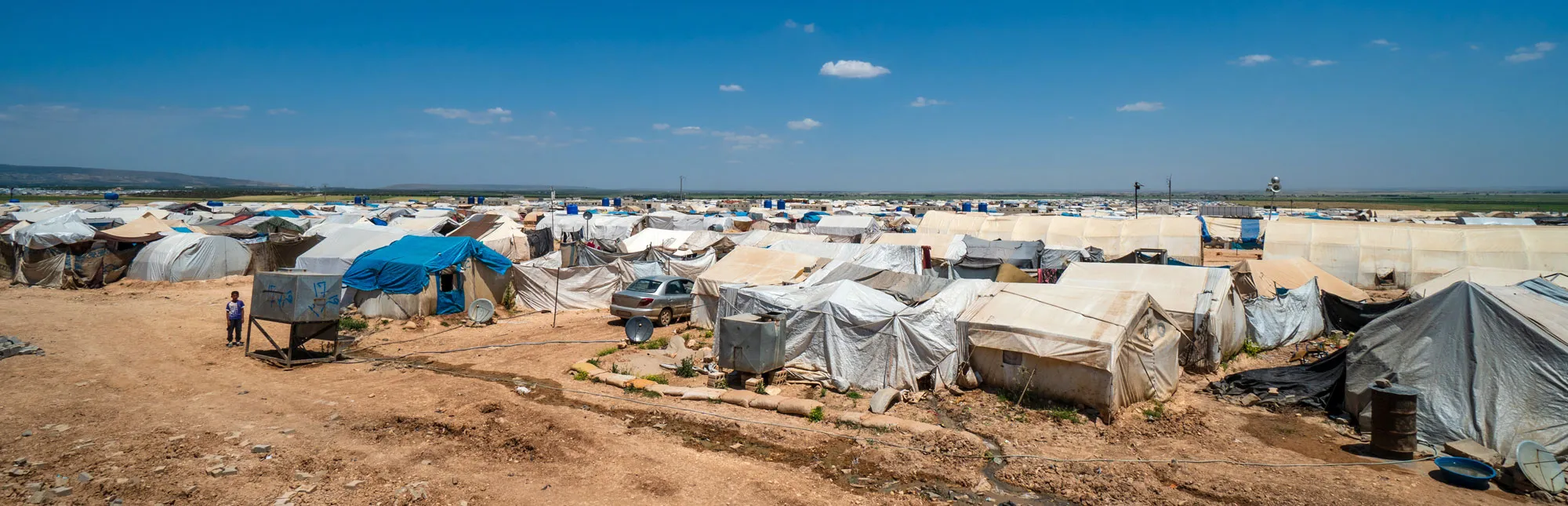 Quelle: hikrcn – stock.adobe.com Blick auf Zelte eines Flüchtlingscamp